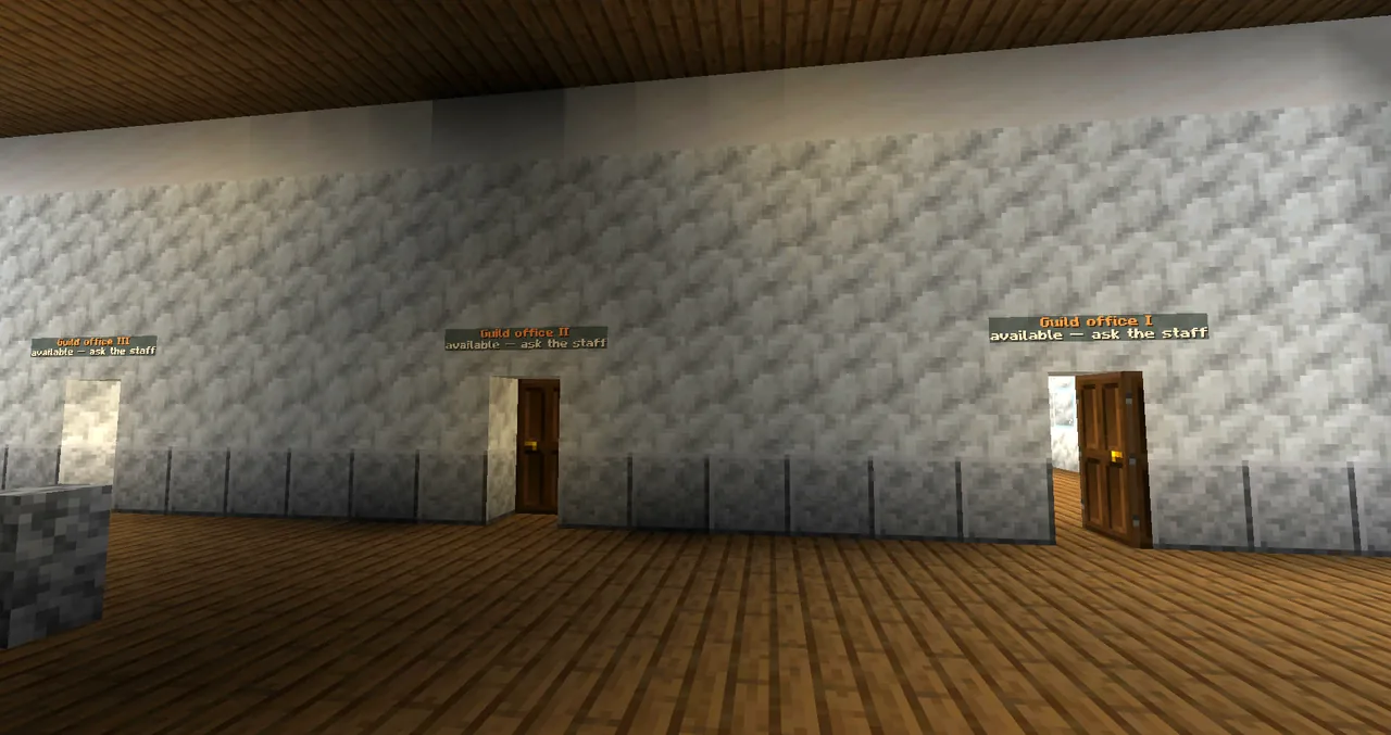 The three guild offices on the town hall's first floor, each with its name at the door.