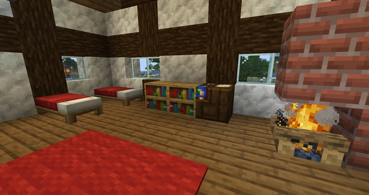 Inside the lodge at the Diggings outpost: beds, bookshelves and a lit fireplace.